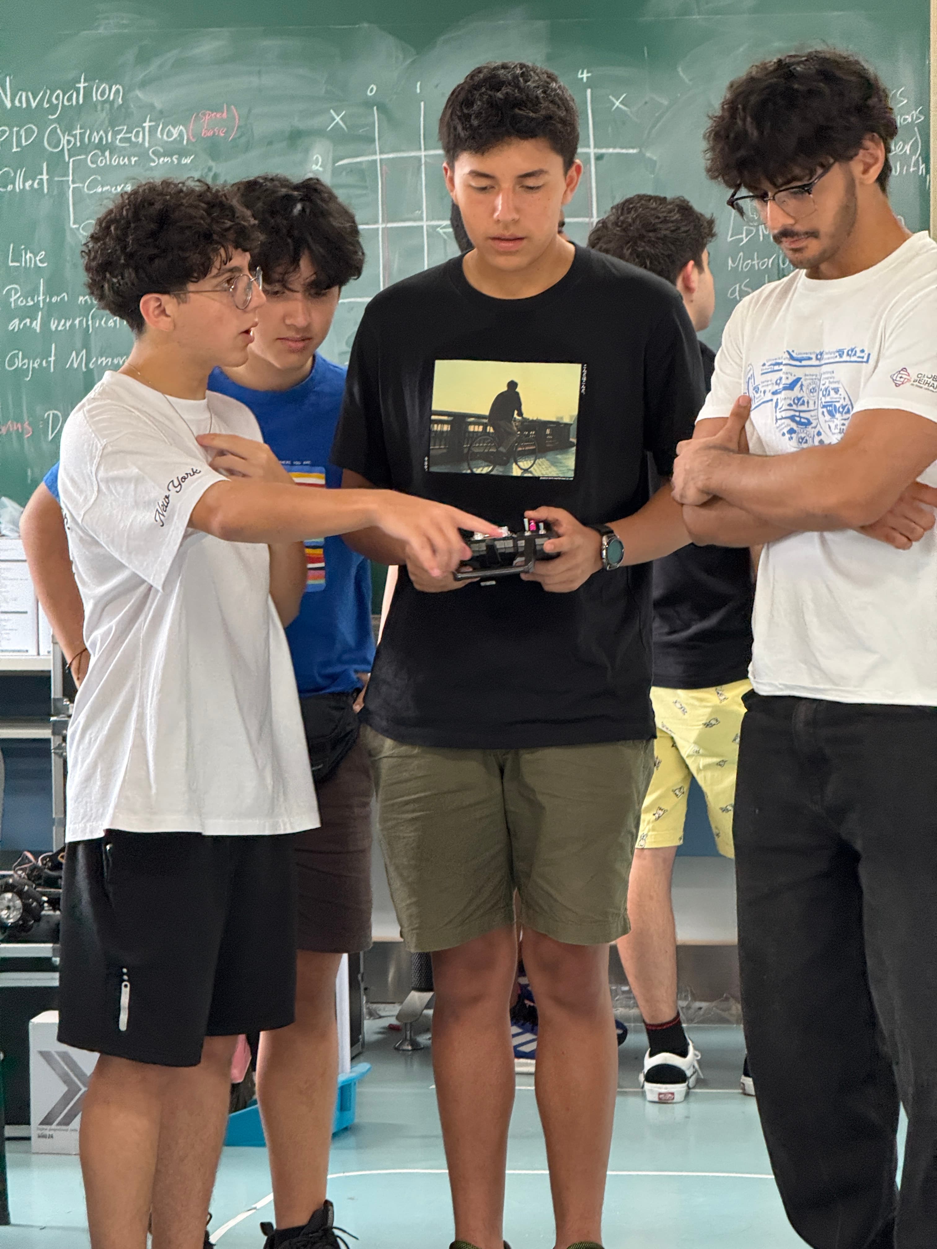 Students sharing a robotics activity during an exchange