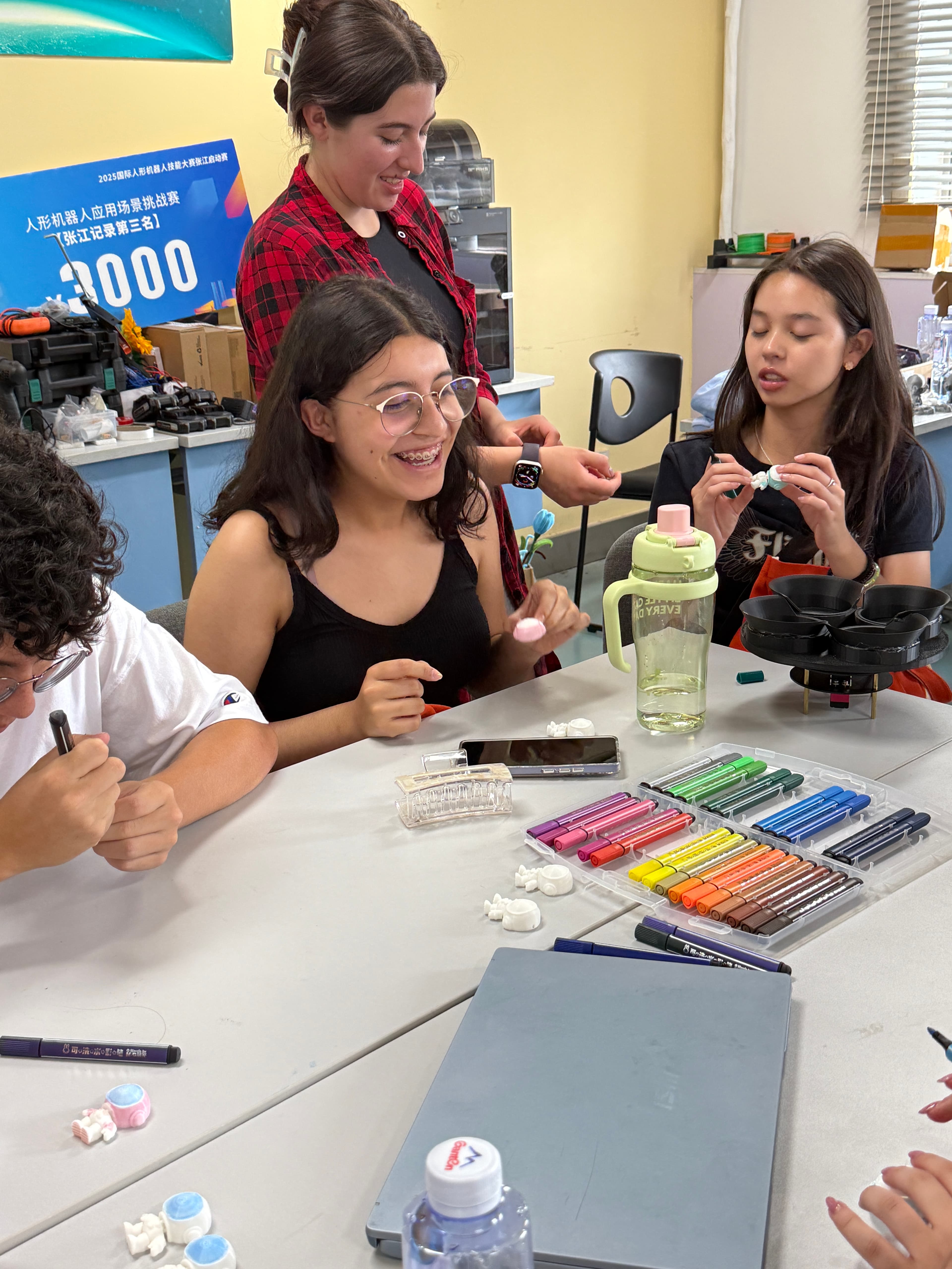 International students during a robotics demonstration